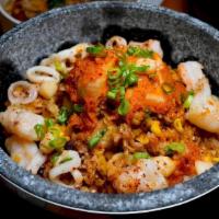 Kimchi Bokum Bap · wok fried rice with buttered kimchi, egg, shrimp, scallops, squid, onions, peas, asparagus, ...