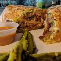 Steak Burrito · A flour tortilla stuffed with lettuce, beans, jalapenos, rice, Monterrey cheese, guacamole, ...