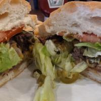 Steak Torta · A traditional Mexican sandwich made with fresh bread, lettuce, avocado, beans, mayonnaise, j...