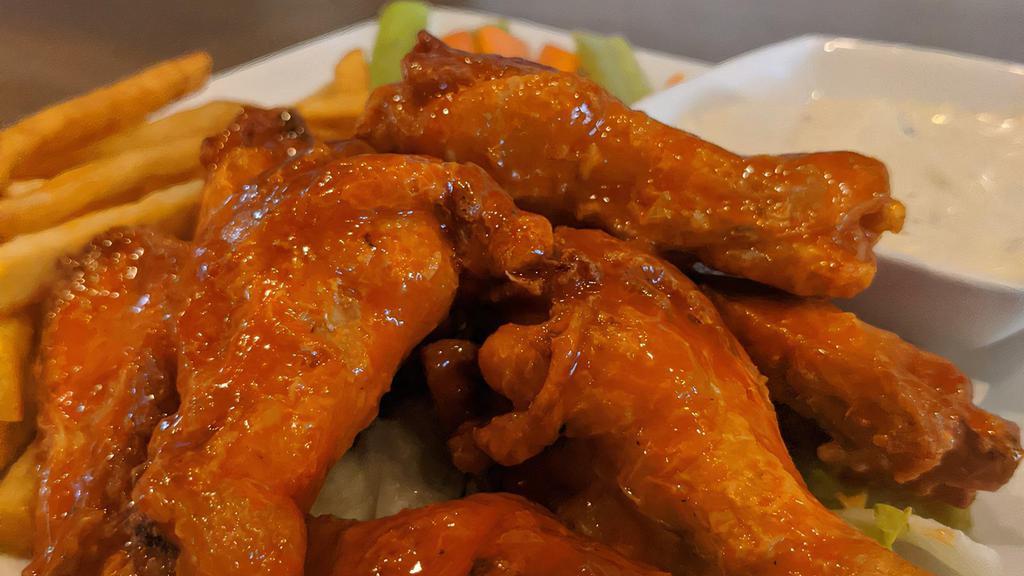 Buffalo Wings · Served with French fries and a side of blue cheese.