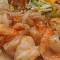 Shrimp & Garlic · Marinated in white wine, garlic Dorado, and seafood sauce served with rice and salad.