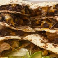 Seasoned Steak Quesadilla · Grilled flour tortillas with Monterrey jack cheese, mushrooms, green peppers, and sauteed on...