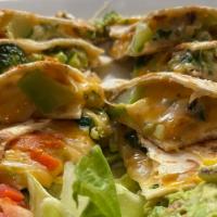 Vegetarian Quesadilla · Grilled flour tortillas with Monterrey jack cheese, mushrooms, green peppers, and sauteed on...