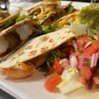 Shrimp Quesadilla · Grilled flour tortillas with Monterrey jack cheese, mushrooms, green peppers, and sauteed on...