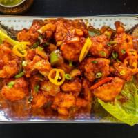 Gobi Manchurian  · Vegetarian. Vegan. Crispy cauliflower florets tossed in a mild hot & sweet chili garlic sauc...