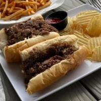 Pizza Chicken Cheesesteak · on a long roll served with chips