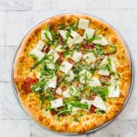White Margherita Pizza · Garlic sauce, fresh mozzarella, regular mozzarella, chopped fresh basil and splash of plum t...