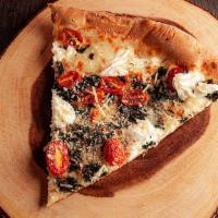 Mediterranean Pizza · White pizza with fresh spinach, grape tomatoes, and ricotta cheese.