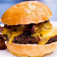 Texas Cheeseburger Platter · Cheddar cheese, bacon and house BBQ sauce. Includes lettuce, tomato, onions, a portion of fr...