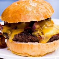 Texas Cheeseburger · cheddar cheese, bacon, and house bbq sauce
