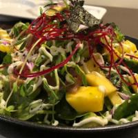 Tuna Wonton Nachos With Mango Salad & Wasabi Mayo · Seared tuna, chopped mango, avocado, seeds, and greens with chef's special dressing bedded, ...