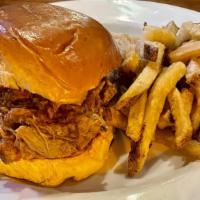 Pulled Pork Sandwich · Marinated Pulled Pork, Coleslaw, Kaiser Roll. Served with Fries