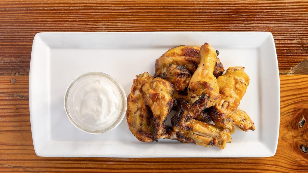 Grilled Chicken Wings · Crystal Hot Sauce, Butter & Blue Cheese
