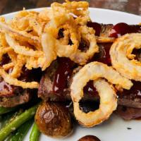 Bbq Meatloaf · roasted potatoes, green beans, crispy red onions