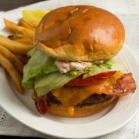 Bacon Cheeseburger Deluxe · All beef. burger  charbroiled to perfection. Topped with bacon, cheese, lettuce, tomato, and...