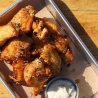 Lemon Pepper Wings · served with a garlic parmesan dip (gluten free upon request)