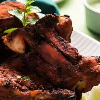 Tandoori Chicken (Full) · Chicken marinated in yogurt and spices, broiled the tastiest way to BBQ chicken.