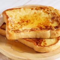 French Toast · Our delicious french toast made with thick bread, then sprinkled with cinnamon and powdered ...