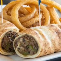 Steak Bomb · Steak and cheese with mushrooms, peppers and onions.