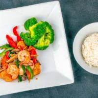 Shrimp Emerald · Sauteed of shrimp and tofu, mushroom, scallion, red & green pepper, ginger, garnished with s...
