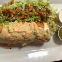 Chimichanga · Fried burrito served with rice, beans, lettuce, pico de gallo, sour cream, cheese and meat o...