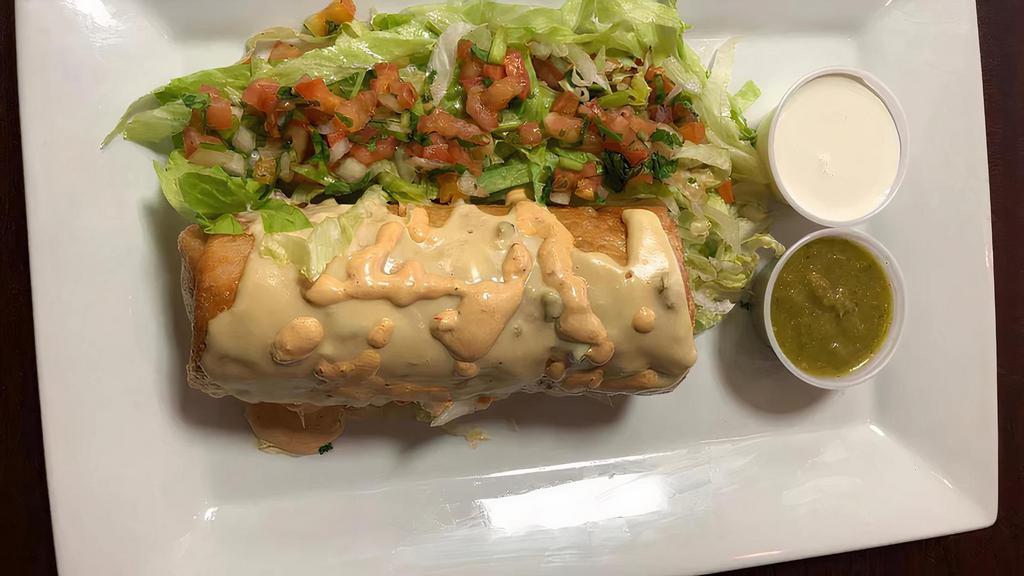 Chimichanga · Fried burrito served with rice, beans, lettuce, pico de gallo, sour cream, cheese and meat of your choice