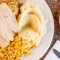 Fresh Oven Roasted Turkey & Stuffing Meal · Fresh sliced turkey breast served with stuffing and your choice of two sides. Served with gr...
