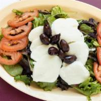 Caprese Special Salad
 · Mixed Greens, marinated mushrooms, basil, tomatoes, Kalamata olives, roasted red peppers and...