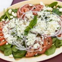 Spinach Salad · Baby spinach, red onions, tomato, feta cheese.