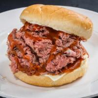 Super Roast Beef Sandwich · Sandwich with thinly sliced beef that has been cooked over dry heat.