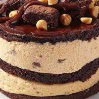 Peanut Butter Explosion · Chocolate fudge topped with peanut butter mousse and chocolate cake and Reese's peanut butte...
