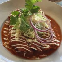 Enchiladas · Three homemade tortillas filled with pulled chicken and Oaxaca cheese, covered with your cho...