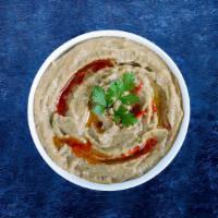 Baba Ghanoush Blast · Baked eggplant, mashed and blended with tahini, yogurt, and parsley. Topped with olive oil a...