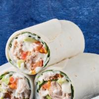 Veggie Hummus Wrap · Fresh cooked chickpeas blended with Middle Eastern spices, lemon juice and olive oil, rolled...