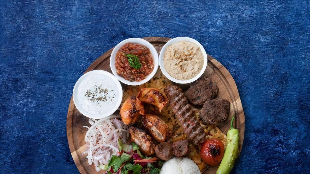 Beef Kabob Plate · Served with rice, salad and pita.
