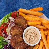 Falafel Frenzy Plate · Four balls of fried chickpeas seasoned with Middle Eastern spices on a bed of Egyptian salad...