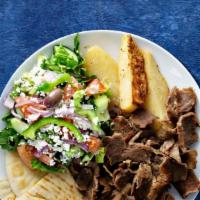 Shredded Lamb Gyro Plate · Served with rice, salad and pita.