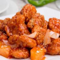 Sweet And Sour Chicken · Served with a choice of appetizer one side of rice and a can of soda.
