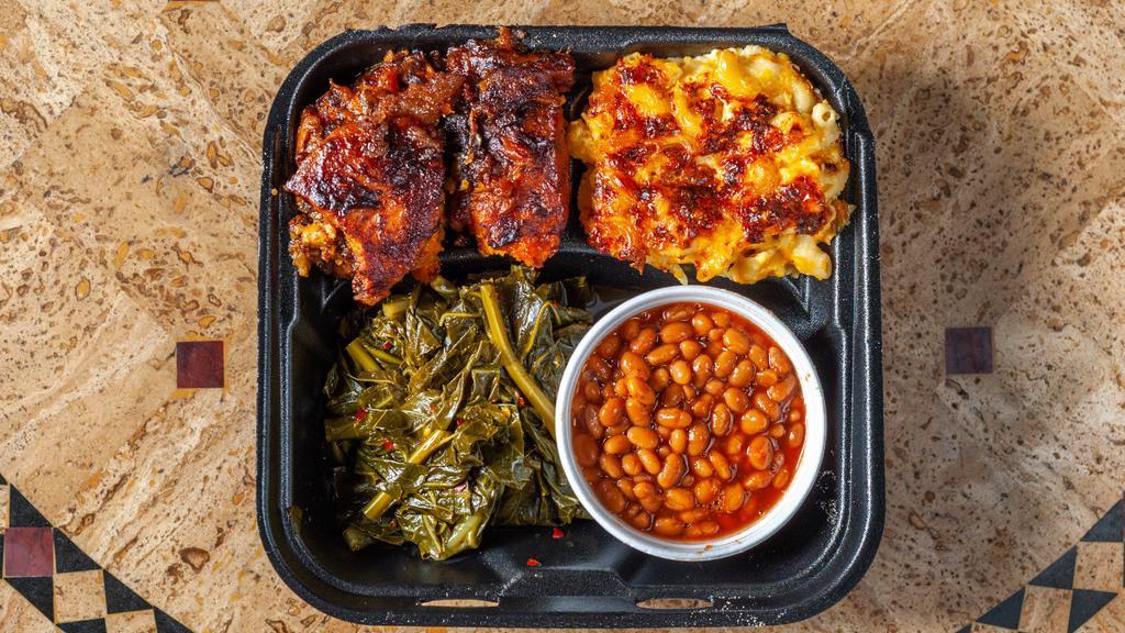 Soul Food Platter · Dee candied yams, Mac 'n' Cheese, collard greens, and vegetarian bake beans.