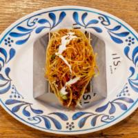 Mexican Chorizo Taco · braised chorizo | jalapenos | pico de gallo | cotija cheese | mexican crema | crispy potatoes
