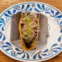 The Vegan Taco · mushroom | red onions | radishes | cilantro | garlic sauce