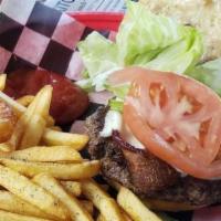 The Blt Burger · Topped with bacon, green leaf lettuce, tomato and garlic aioli. Served with French fries.