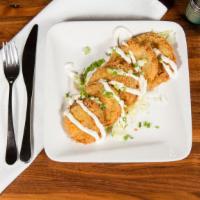 Fried Green Tomatoes · A Southern classic with garlic sauce.