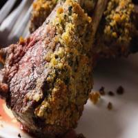 Roasted Rack Of Lamb · Herb crusted, balsamic reduction. Served with side of vegetables.