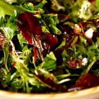 Insalata Mista · Baby mixed field greens with tomatoes & red onions tossed in our signature house dressing.