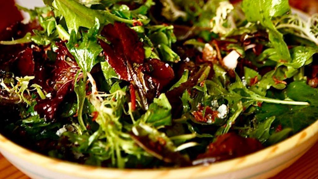 Insalata Mista · Baby mixed field greens with tomatoes & red onions tossed in our signature house dressing.