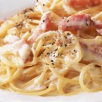 Spaghetti Carbonara · Prosciutto, egg & Parmesan cheese in a cream sauce.