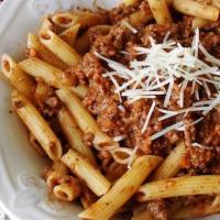 Penne Bolognese · Our rich meat sauce.