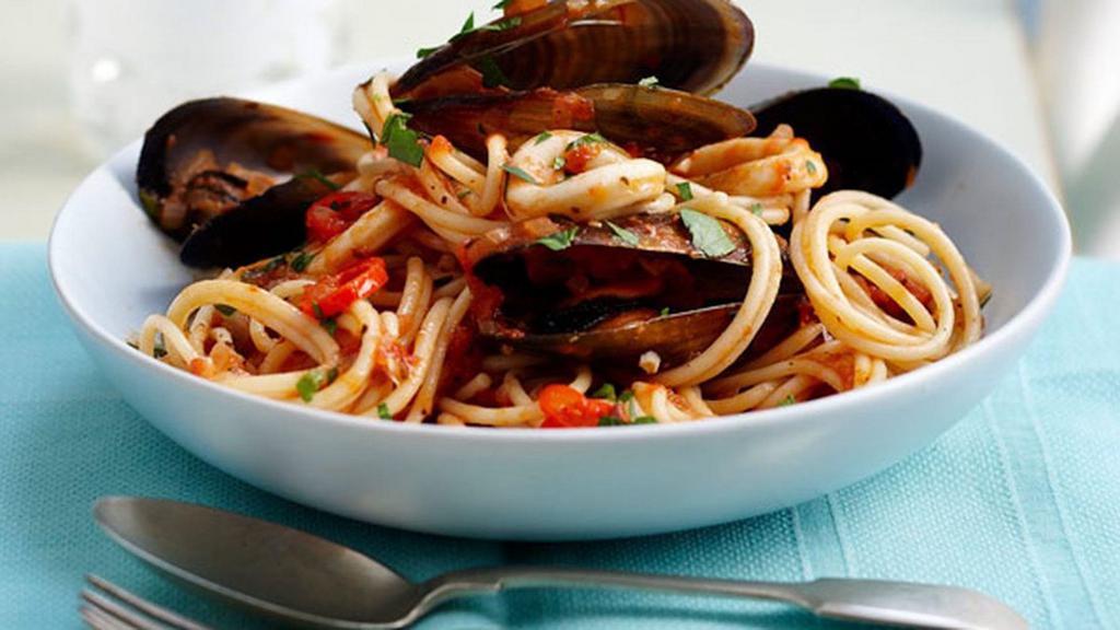 Linguine Frutti Di Mare · Mussels, calamari & crabmeat fresh tomato sauce.
