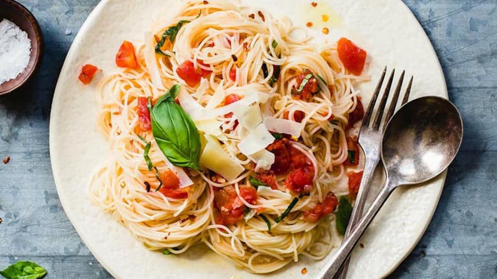 Capellini Angela Mia · Fresh diced tomatoes sauteed with onions, garlic & basil in extra virgin olive oil.